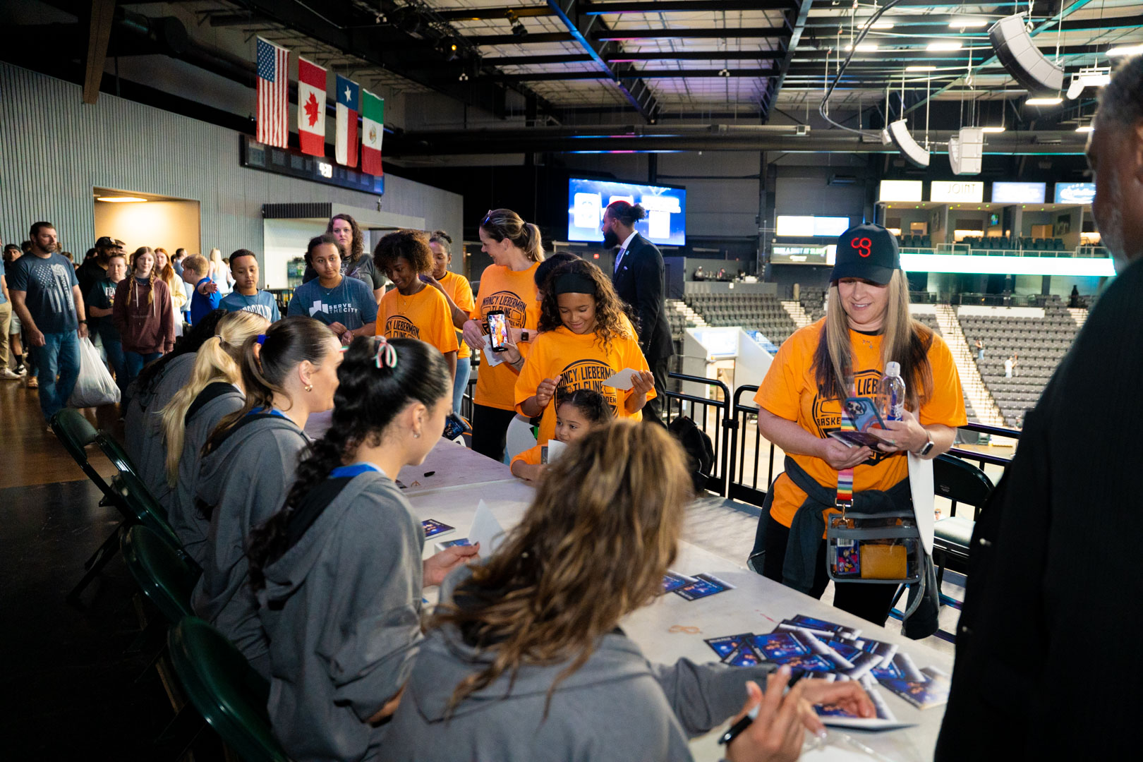 The line at the postgame autograph table, Dallas Pulse players signing for the group
