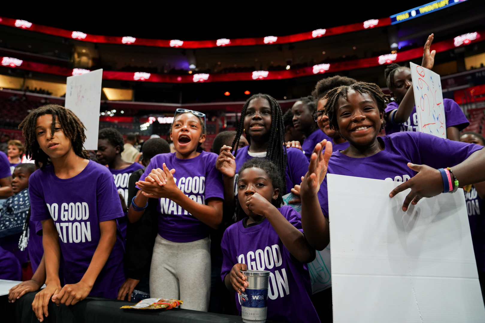 Youth cheering and clapping in The Impact Section during the BIG3 game
